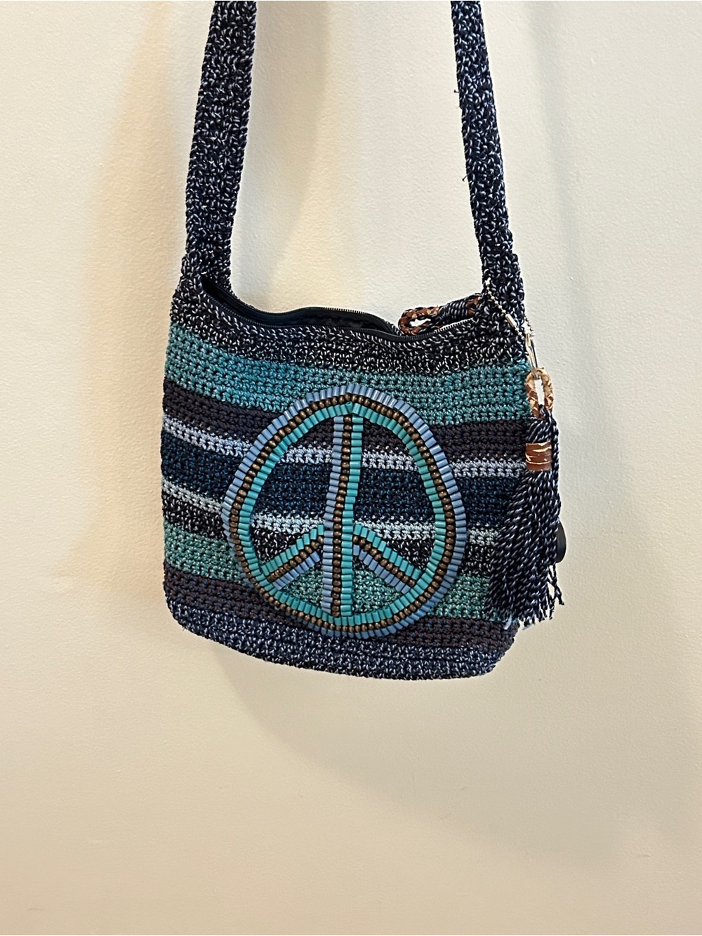 The Sak Dark Blue beaded PeaceSign Crossbody Bag